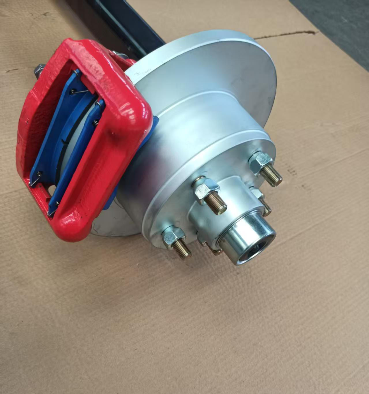 3500 lb torsion axle with brake disc.jpg